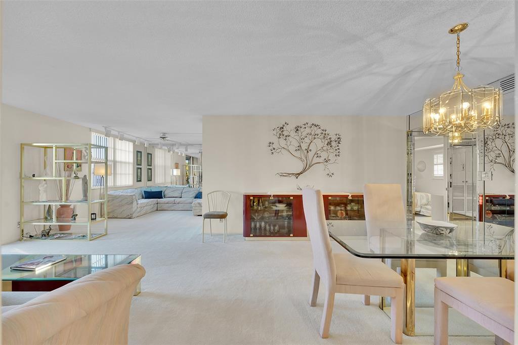 5340 Northwest 2nd Avenue, Unit PH26 Boca Raton, FL 33487 - Photo 10 of 53 a view of a living room and kitchen