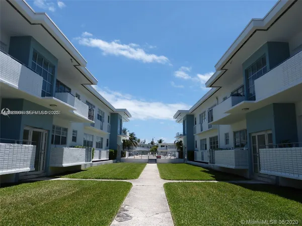 a view of a back yard of the house