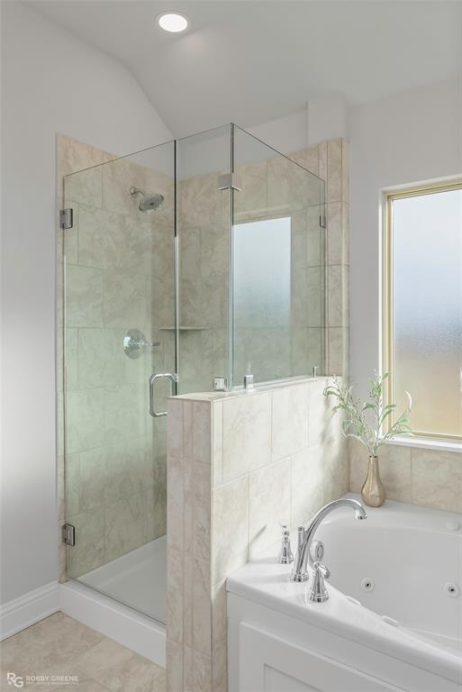 727 Bianca Street Haughton, LA 71037 - Photo 13 of 22 a bathroom with a bathtub and a shower