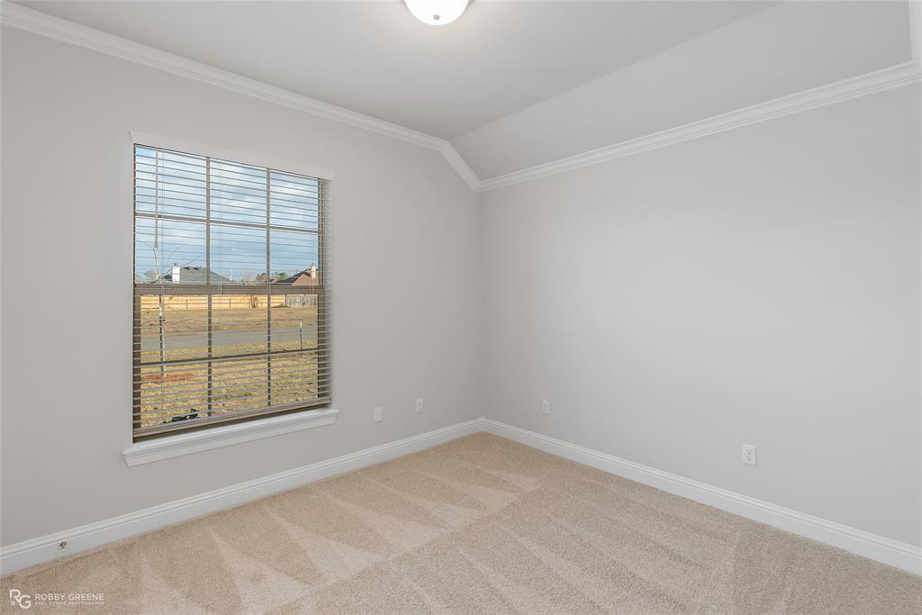 727 Bianca Street Haughton, LA 71037 - Photo 14 of 22 an empty room with windows