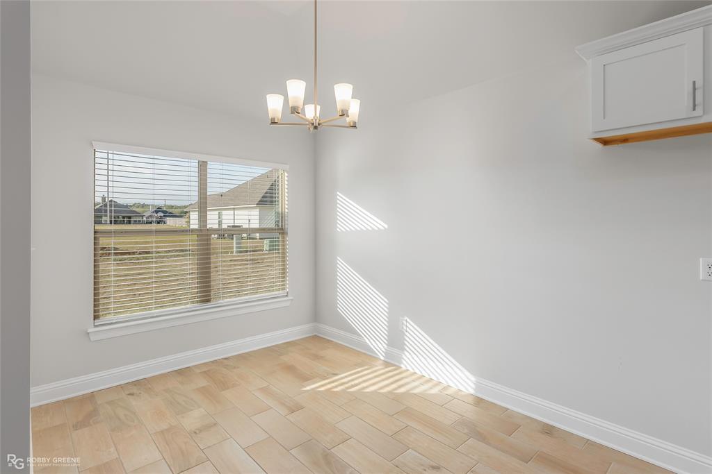 727 Bianca Street Haughton, LA 71037 - Photo 8 of 22 a view of an empty room with a window