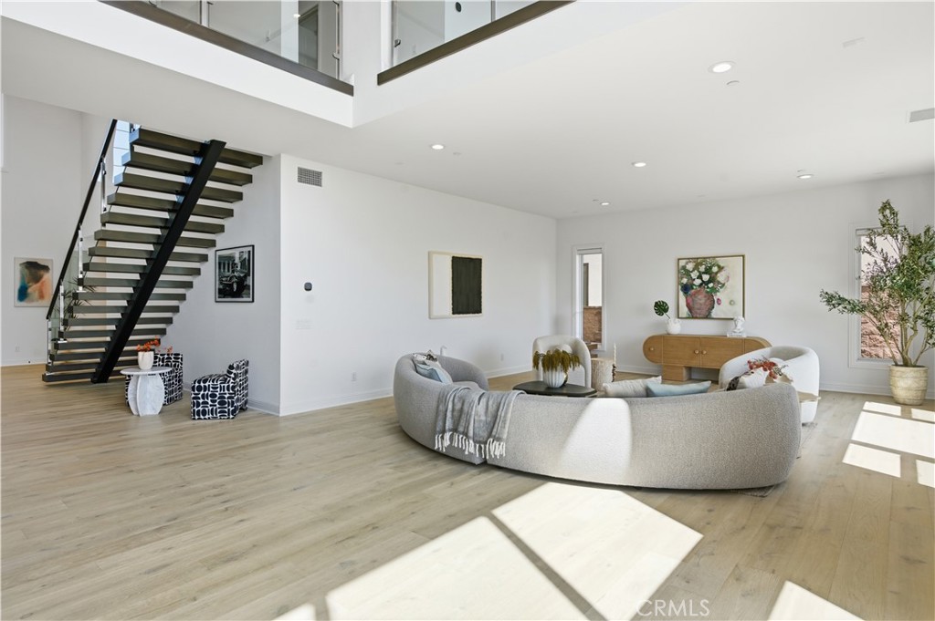 20164 Galway Lane Porter Ranch, CA 91326 - Photo 18 of 48 Sun-filled living area with elevated volume and openness