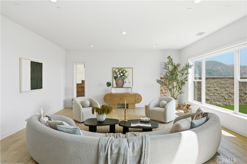 20164 Galway Lane Porter Ranch, CA 91326 - Photo 19 of 48 Inviting living area offering comfortable, well-defined seating within a grand space