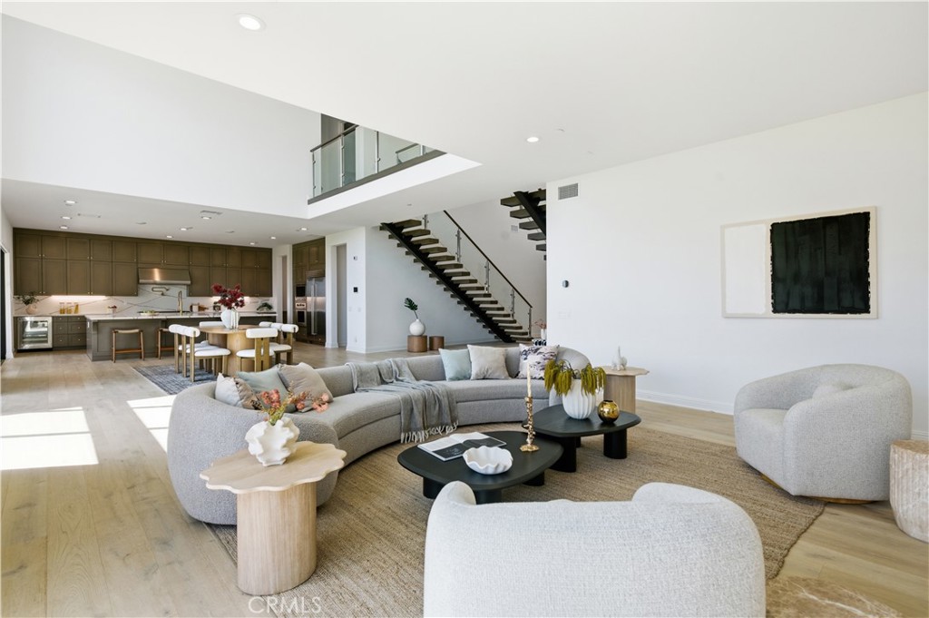 20164 Galway Lane Porter Ranch, CA 91326 - Photo 20 of 48 Open living and dining spaces designed for seamless flow and connection
