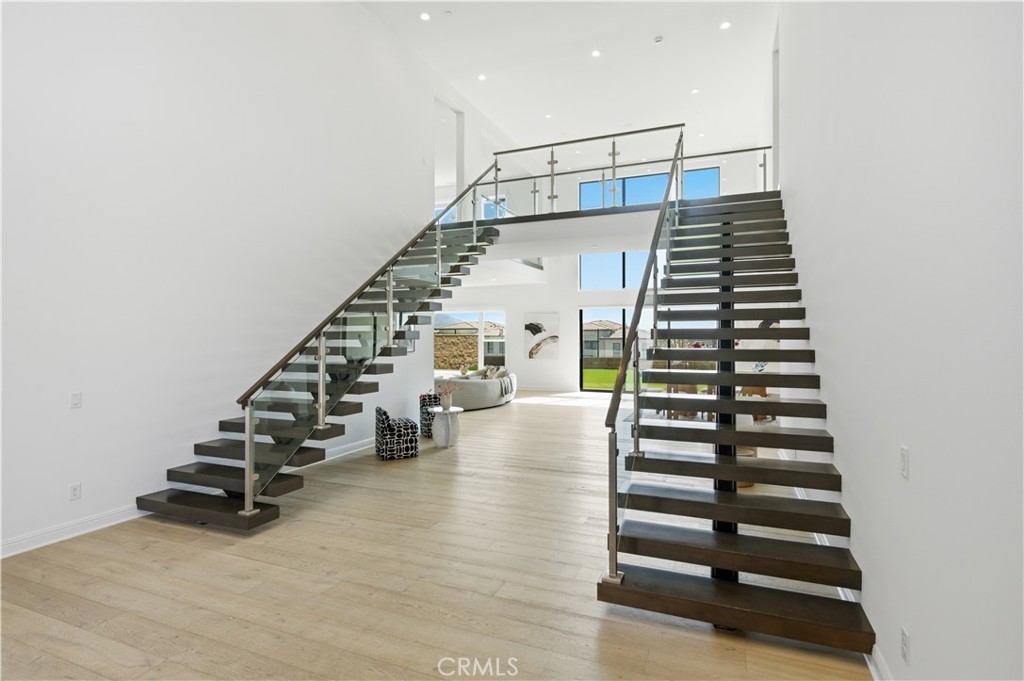20164 Galway Lane Porter Ranch, CA 91326 - Photo 2 of 48 Architectural floating staircase creating a dramatic sense of scale and openness