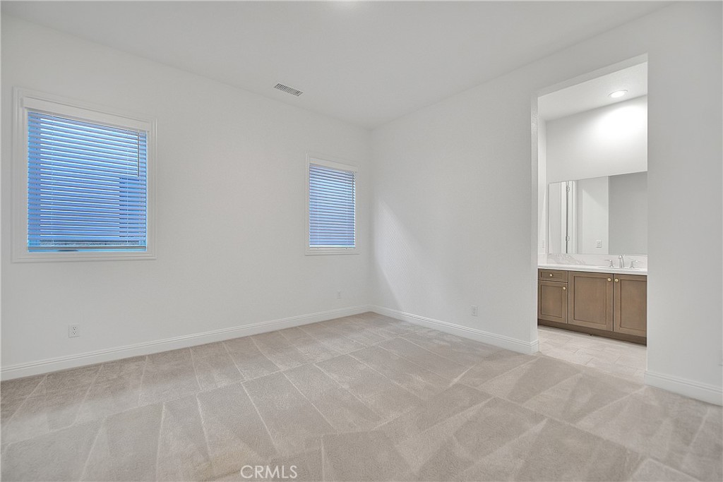20164 Galway Lane Porter Ranch, CA 91326 - Photo 23 of 48 Spacious first floor bedroom with ensuite full bath