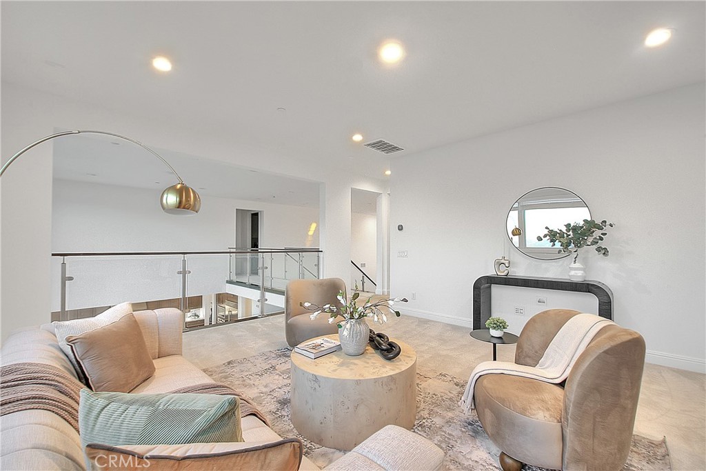 20164 Galway Lane Porter Ranch, CA 91326 - Photo 27 of 48 Bright upper-level loft overlooking the dramatic double-height living spaces