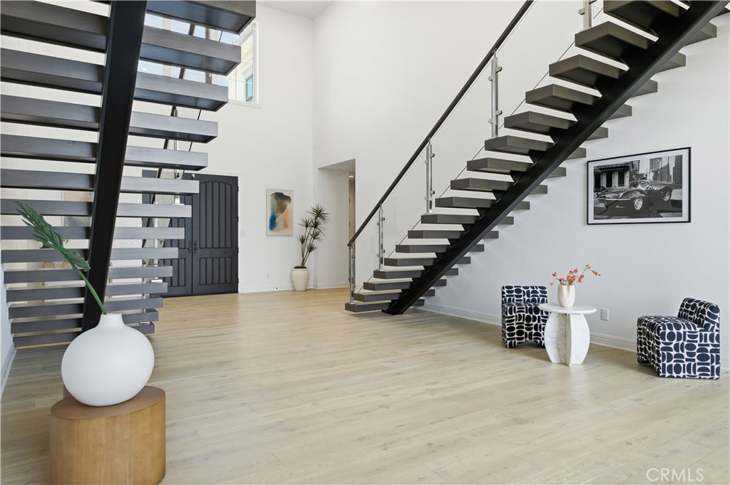 20164 Galway Lane Porter Ranch, CA 91326 - Photo 3 of 48 Sculptural floating staircase showcasing the home’s modern architectural design