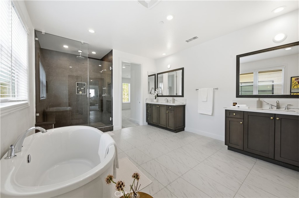 20164 Galway Lane Porter Ranch, CA 91326 - Photo 33 of 48 Spa-inspired primary bath with refined finishes