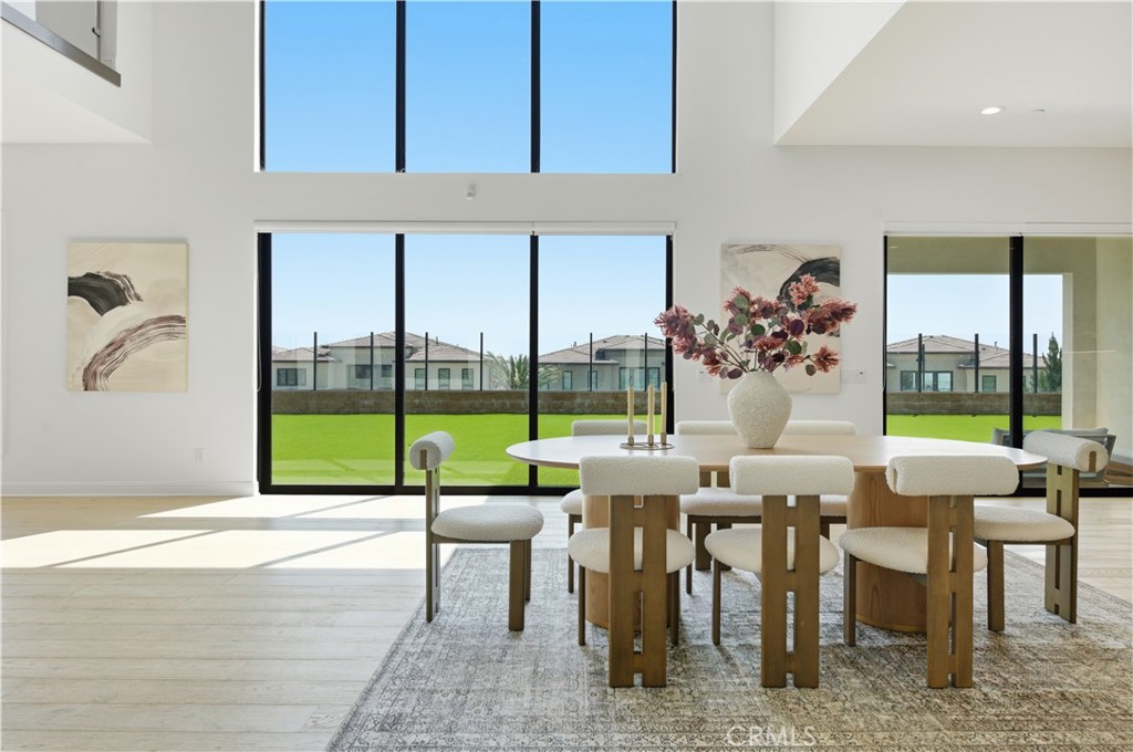 20164 Galway Lane Porter Ranch, CA 91326 - Photo 4 of 48 Grand living space defined by dramatic double-height ceilings