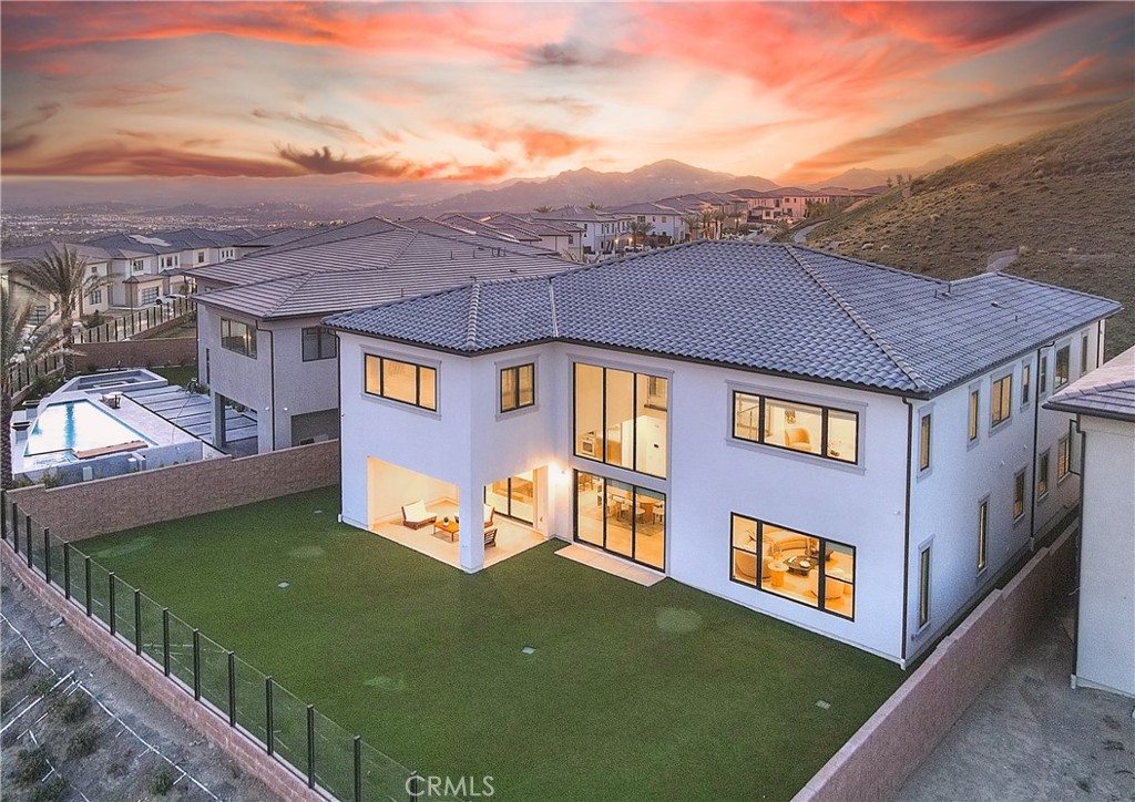20164 Galway Lane Porter Ranch, CA 91326 - Photo 47 of 48 Aerial twilight backyard