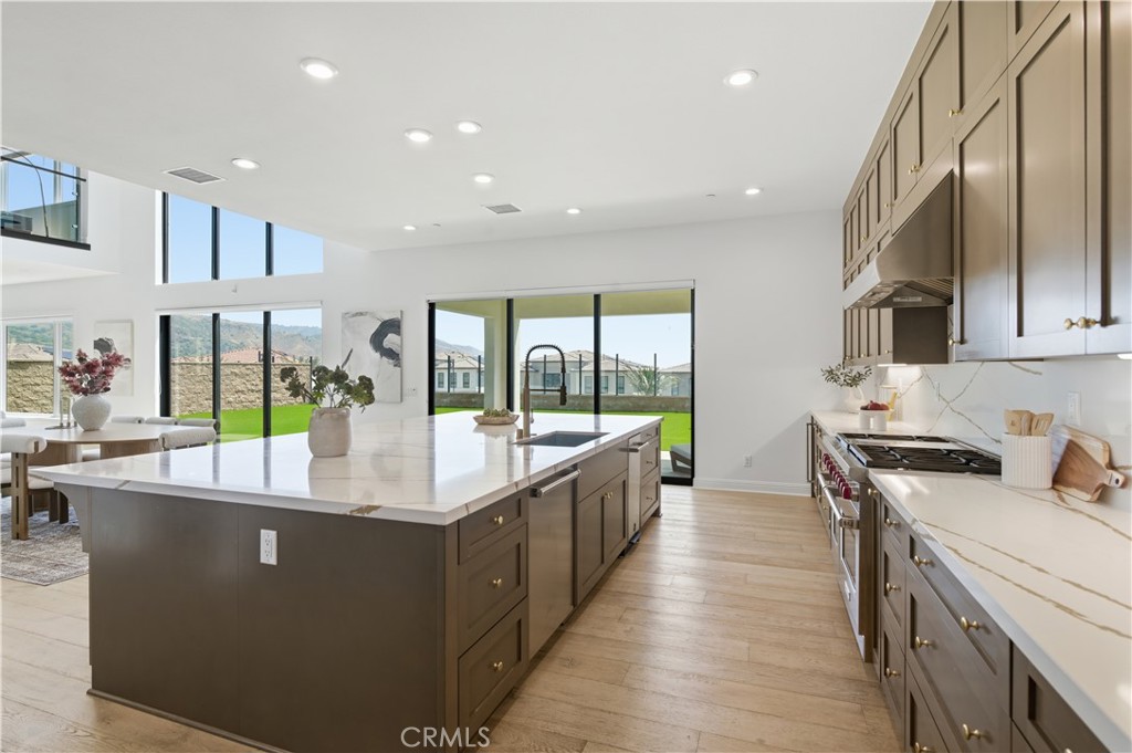 20164 Galway Lane Porter Ranch, CA 91326 - Photo 9 of 48 Oversized sliding glass doors to outdoor seating area