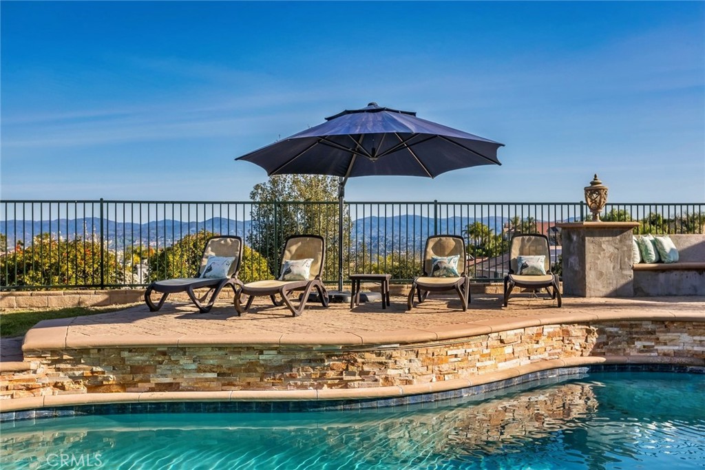 26403 Ocasey Place Stevenson Ranch, CA 91381 - Photo 17 of 27 a view of swimming pool with outdoor seating