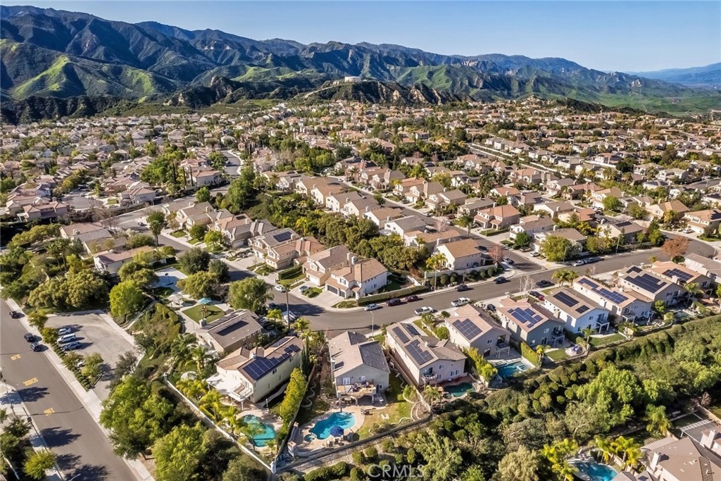 26403 Ocasey Place Stevenson Ranch, CA 91381 - Photo 23 of 27 a view of a city with a mountain