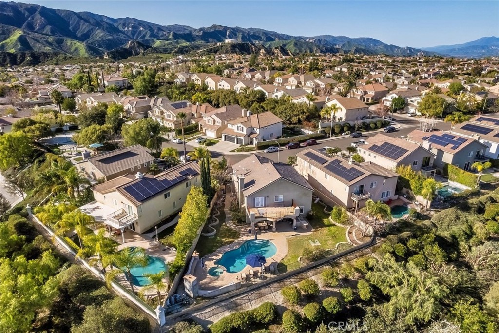 26403 Ocasey Place Stevenson Ranch, CA 91381 - Photo 24 of 27 an aerial view of residential houses with outdoor space