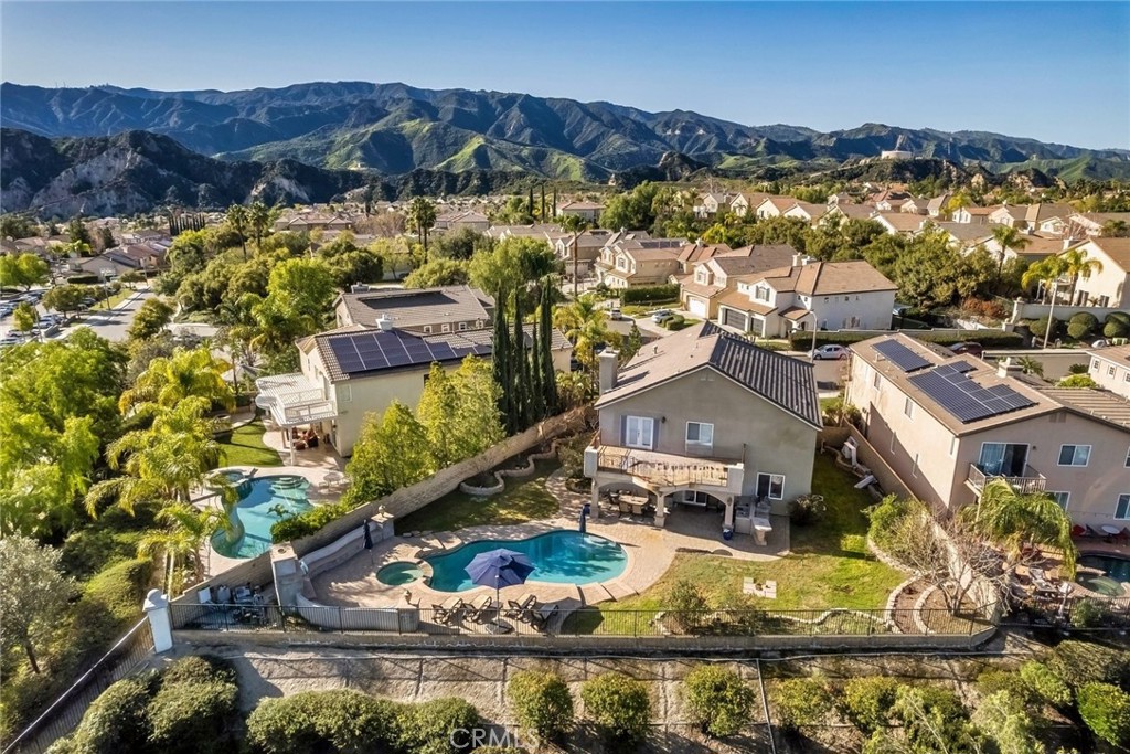 26403 Ocasey Place Stevenson Ranch, CA 91381 - Photo 25 of 27 an aerial view of a house with a ocean view