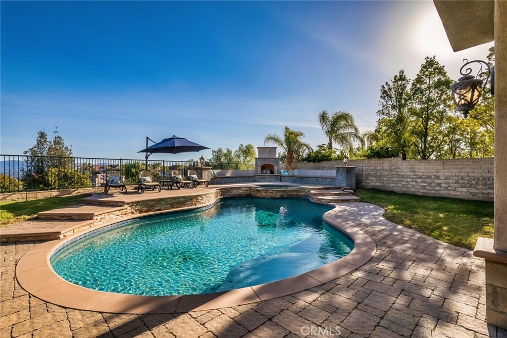 26403 Ocasey Place Stevenson Ranch, CA 91381 - Photo 9 of 27 a view of swimming pool with outdoor seating