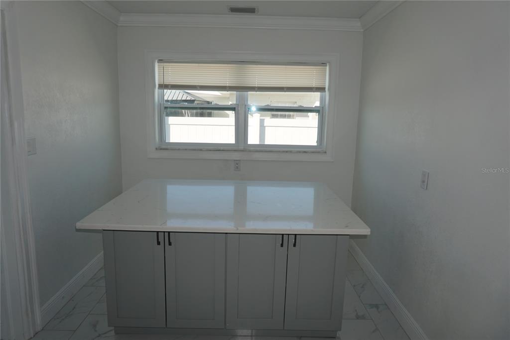 7173 63rd Street North Pinellas Park, FL 33781 - Photo 11 of 15 a room with a window