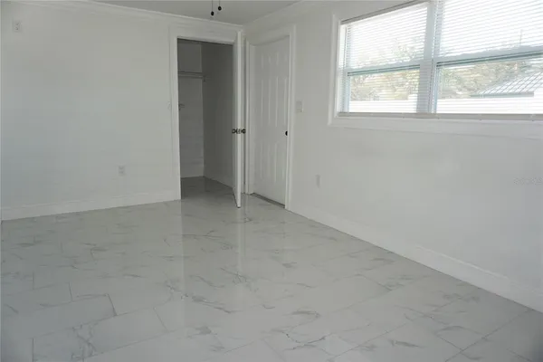 an empty room with windows