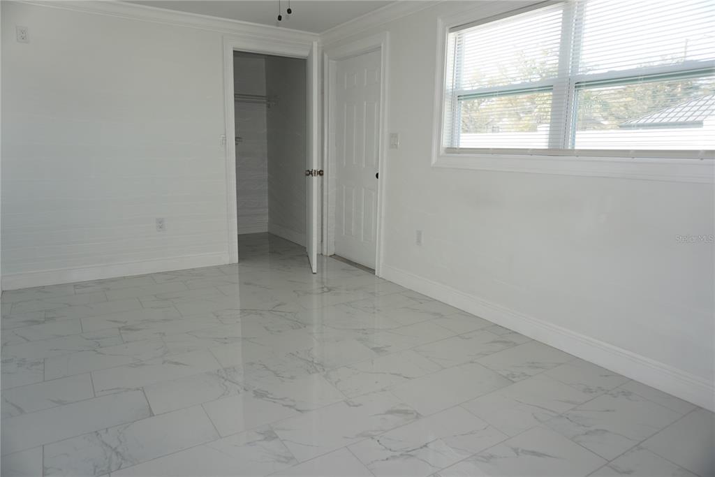 7173 63rd Street North Pinellas Park, FL 33781 - Photo 8 of 15 an empty room with windows