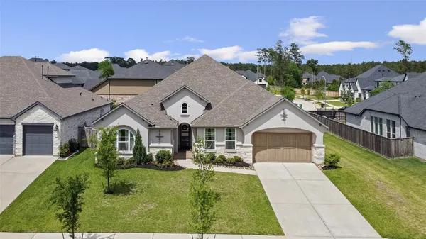 $669,000 | 622 Platinum Stone Lane, Pinehurst, TX 77362