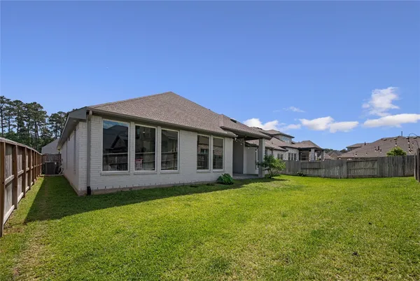 $649,000 | 622 Platinum Stone Lane, Pinehurst, TX 77362