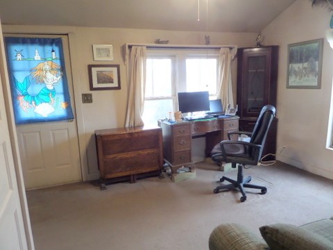 631 Ranck Avenue Mason, TX 76856 - Photo 7 of 17 a view of a workspace with furniture and a window