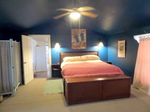 631 Ranck Avenue Mason, TX 76856 - Photo 10 of 17 a bed sitting in a bedroom next to a lamp