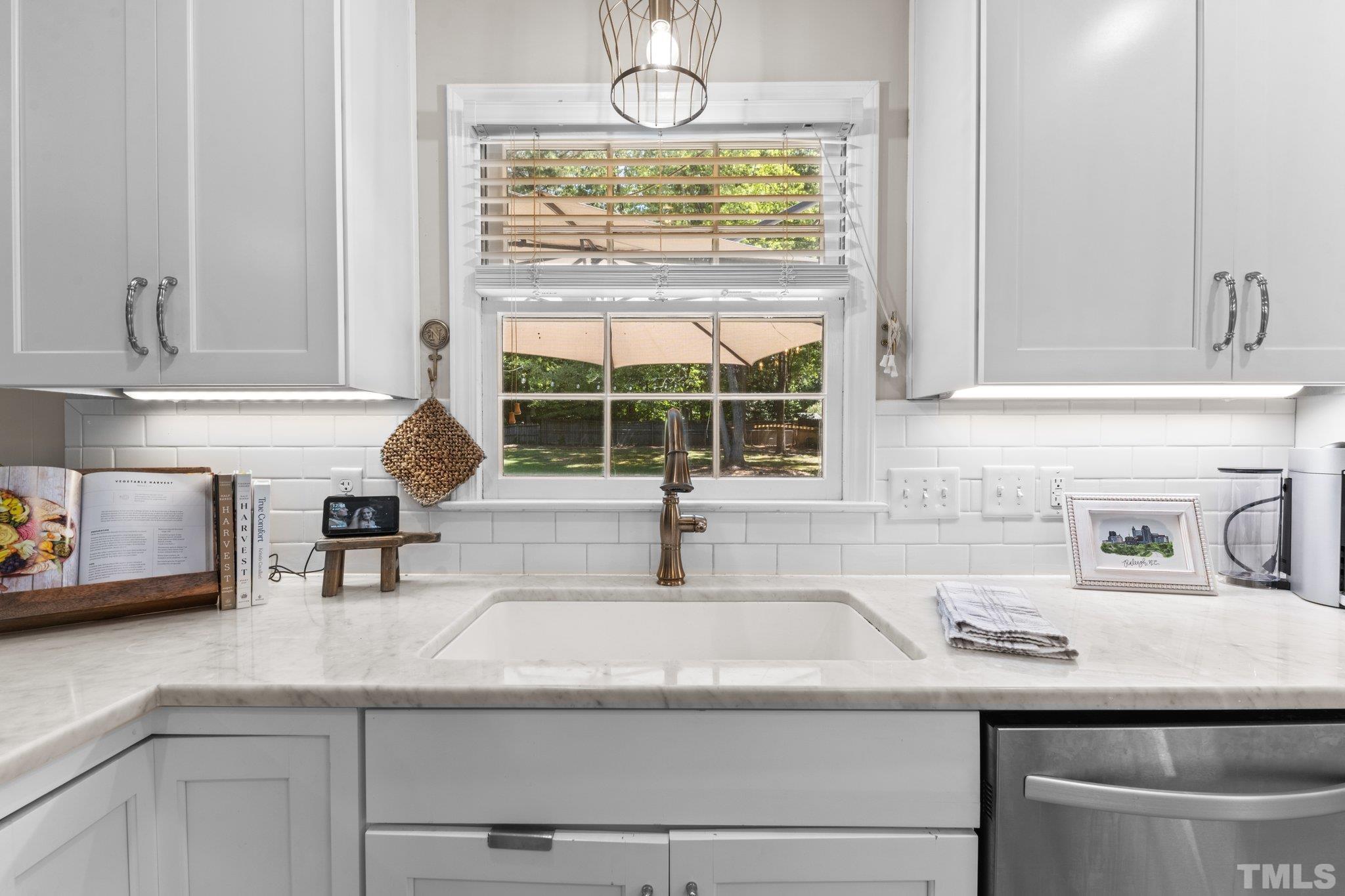 6704 Valley Drive Raleigh, NC 27612 - Photo 13 of 39 a kitchen with sink and window
