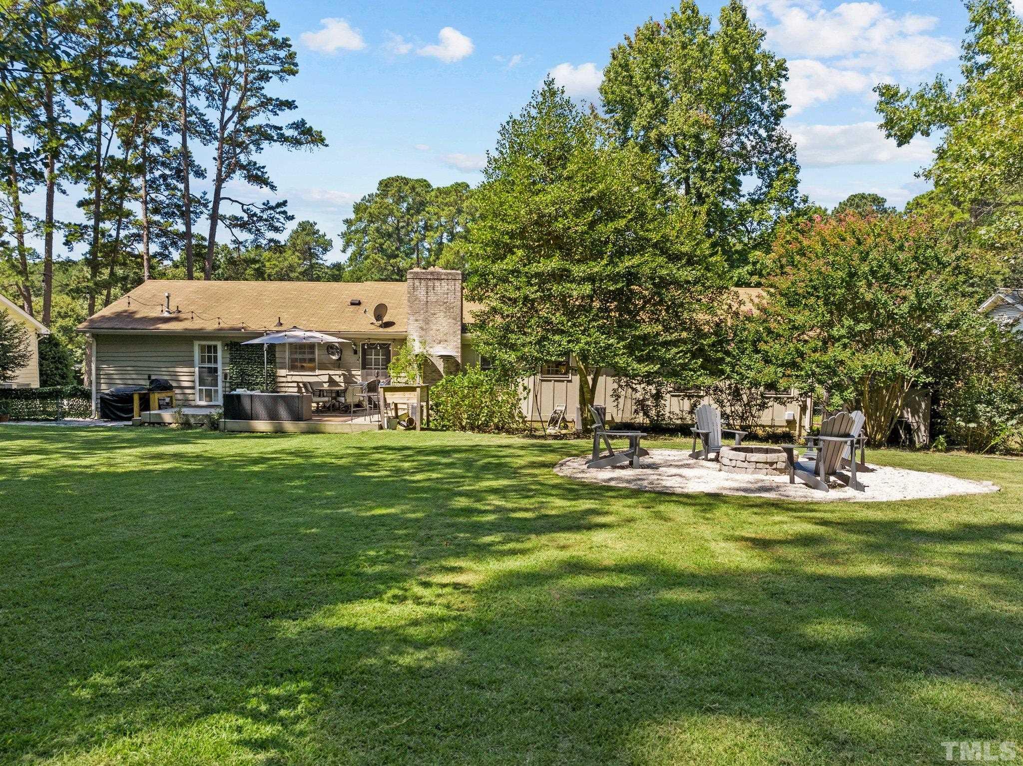 6704 Valley Drive Raleigh, NC 27612 - Photo 32 of 39 a view of a house with a big yard