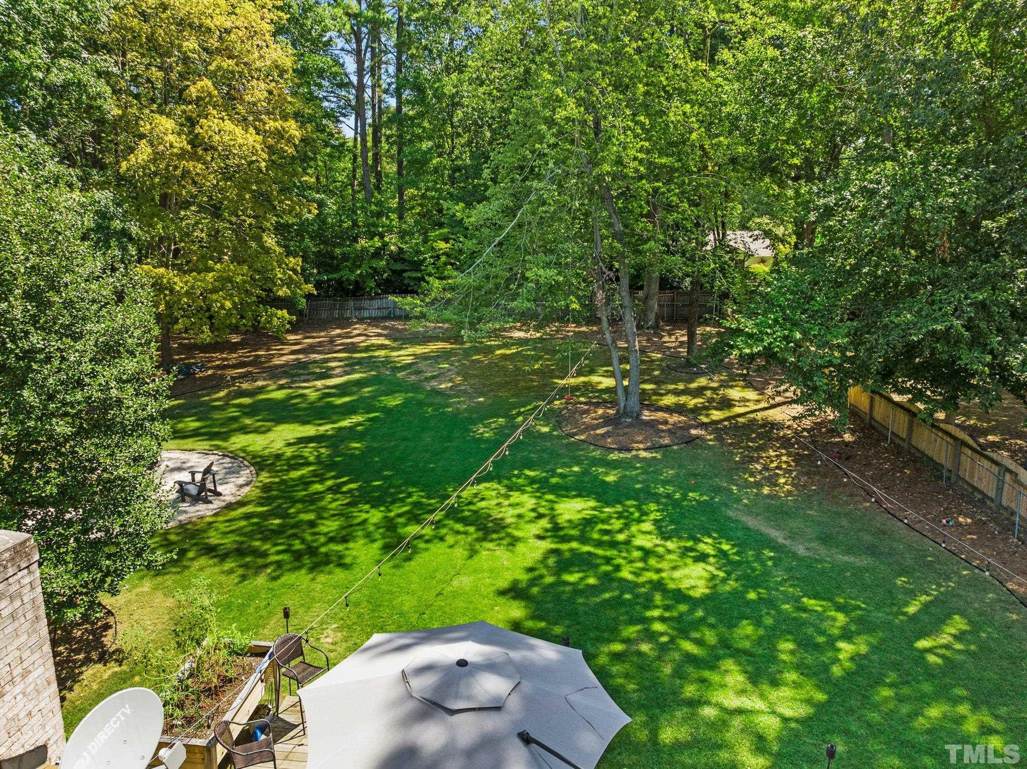 6704 Valley Drive Raleigh, NC 27612 - Photo 35 of 39 a view of yard with green space