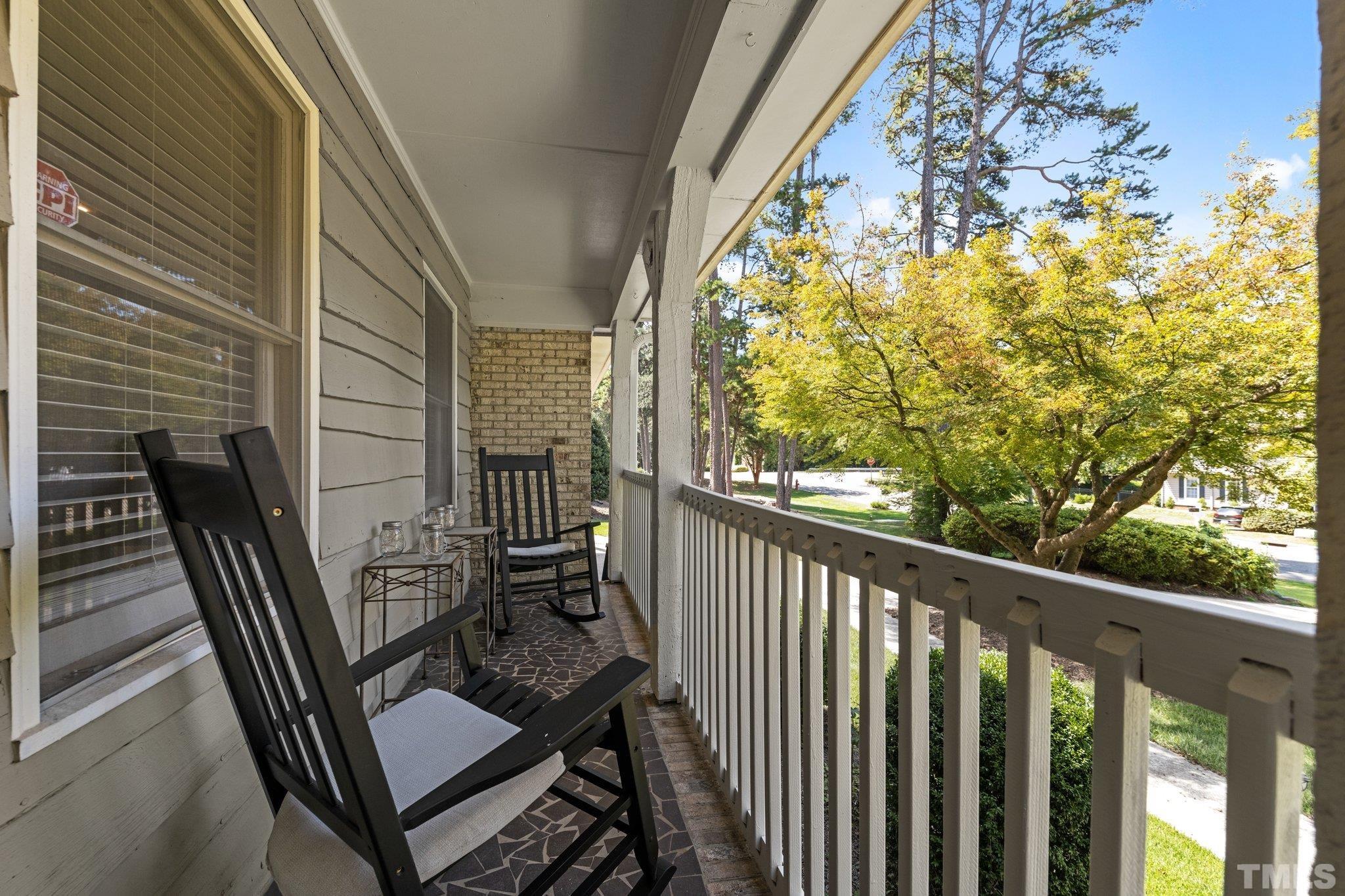 6704 Valley Drive Raleigh, NC 27612 - Photo 4 of 39 a view of a balcony with chairs