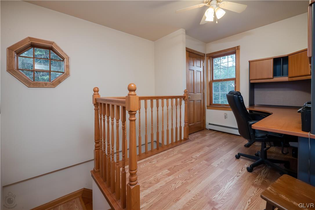 2174 Blue Barn Road Orefield, PA 18069 - Photo 11 of 23 a workspace with wooden floor and a window