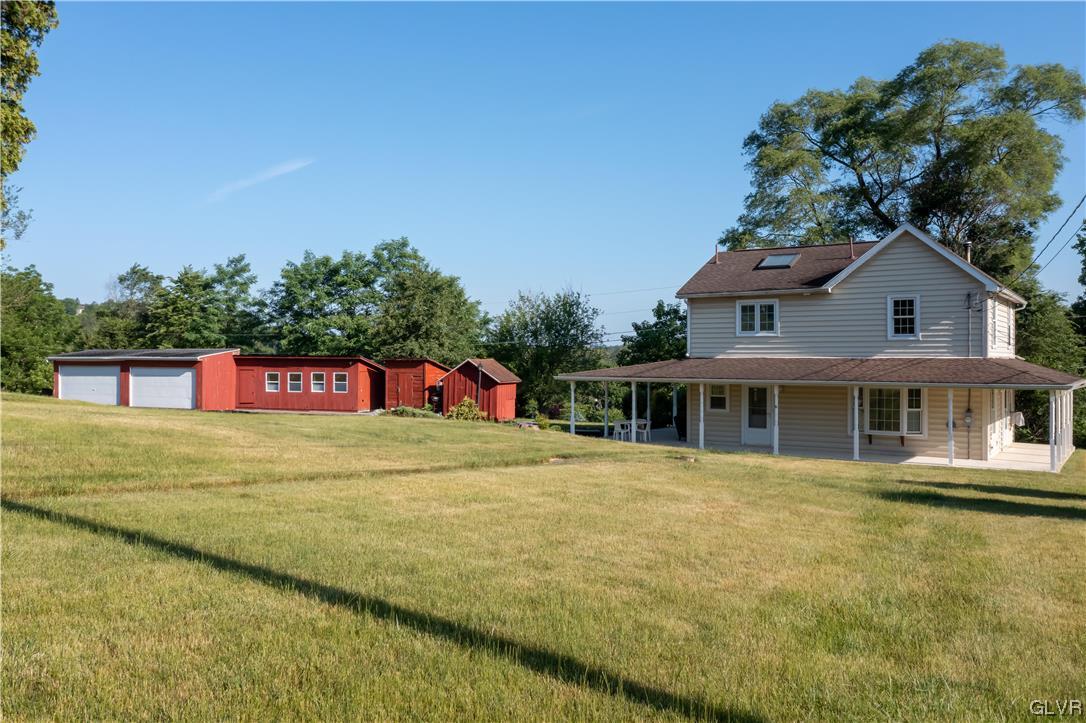 2174 Blue Barn Road Orefield, PA 18069 - Photo 2 of 23 a view of a house with a swimming pool