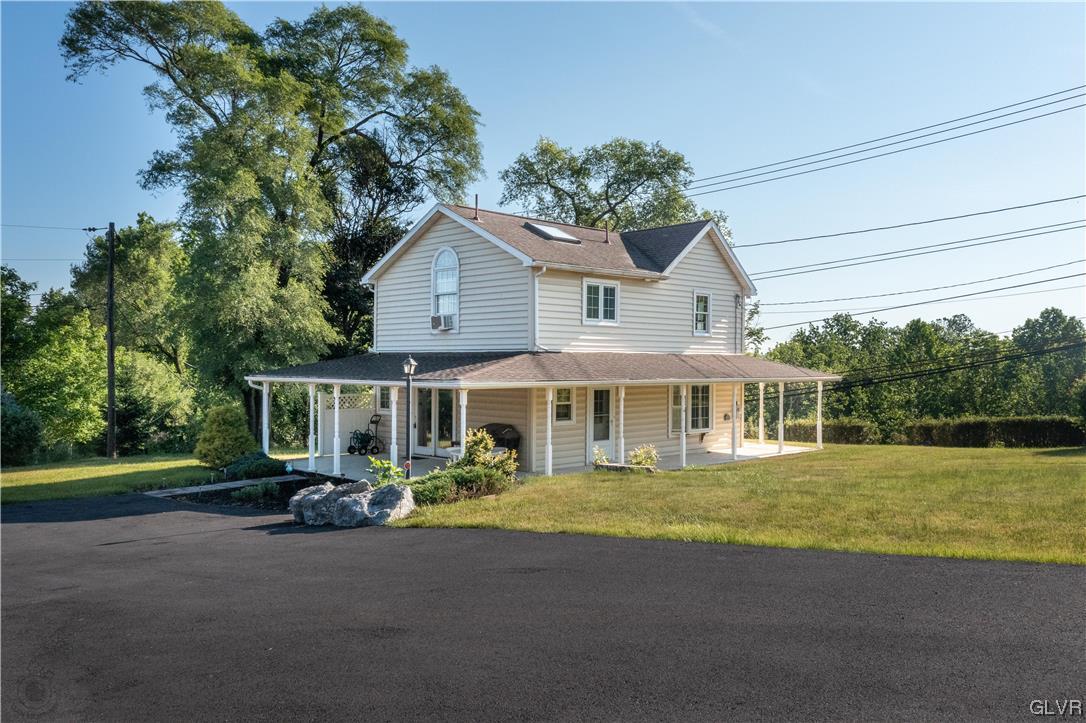 2174 Blue Barn Road Orefield, PA 18069 - Photo 22 of 23 a front view of a house with garden