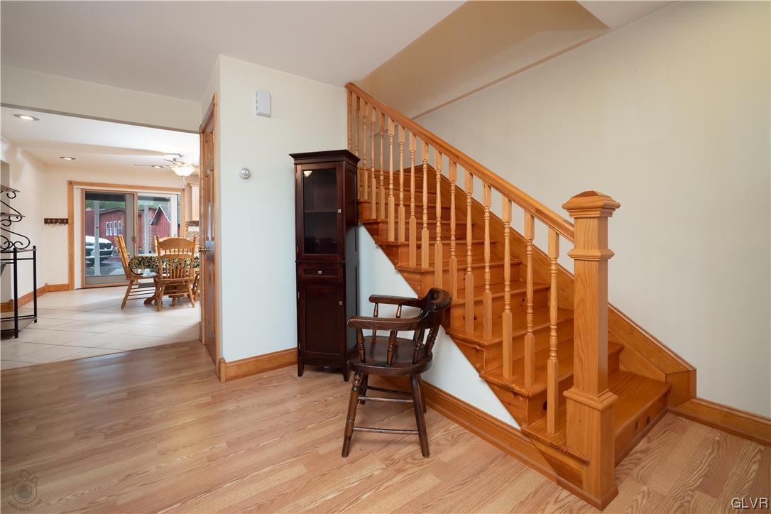 2174 Blue Barn Road Orefield, PA 18069 - Photo 3 of 23 a view of entryway dining room and hall with wooden floor