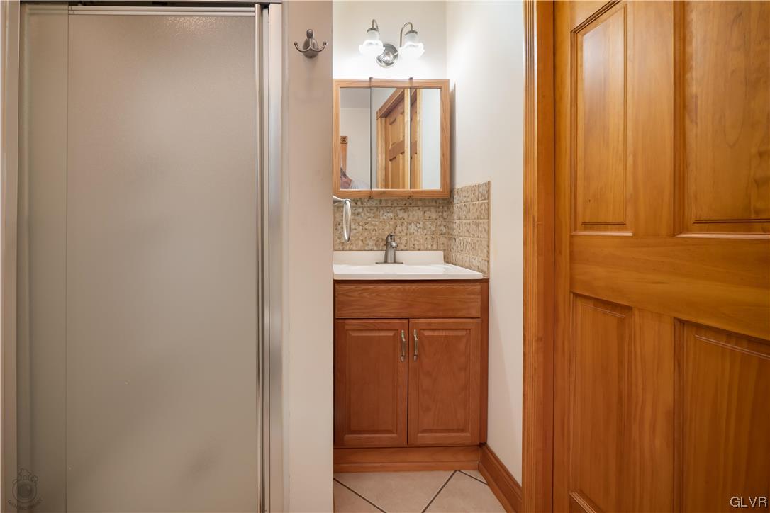 2174 Blue Barn Road Orefield, PA 18069 - Photo 10 of 23 a bathroom with a sink and a mirror