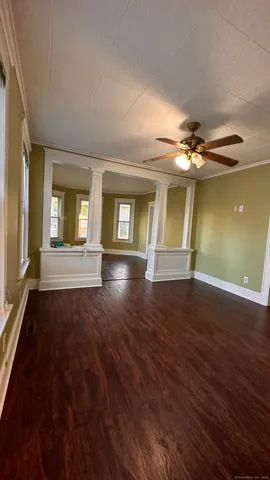 a view of livingroom and hardwood floor
