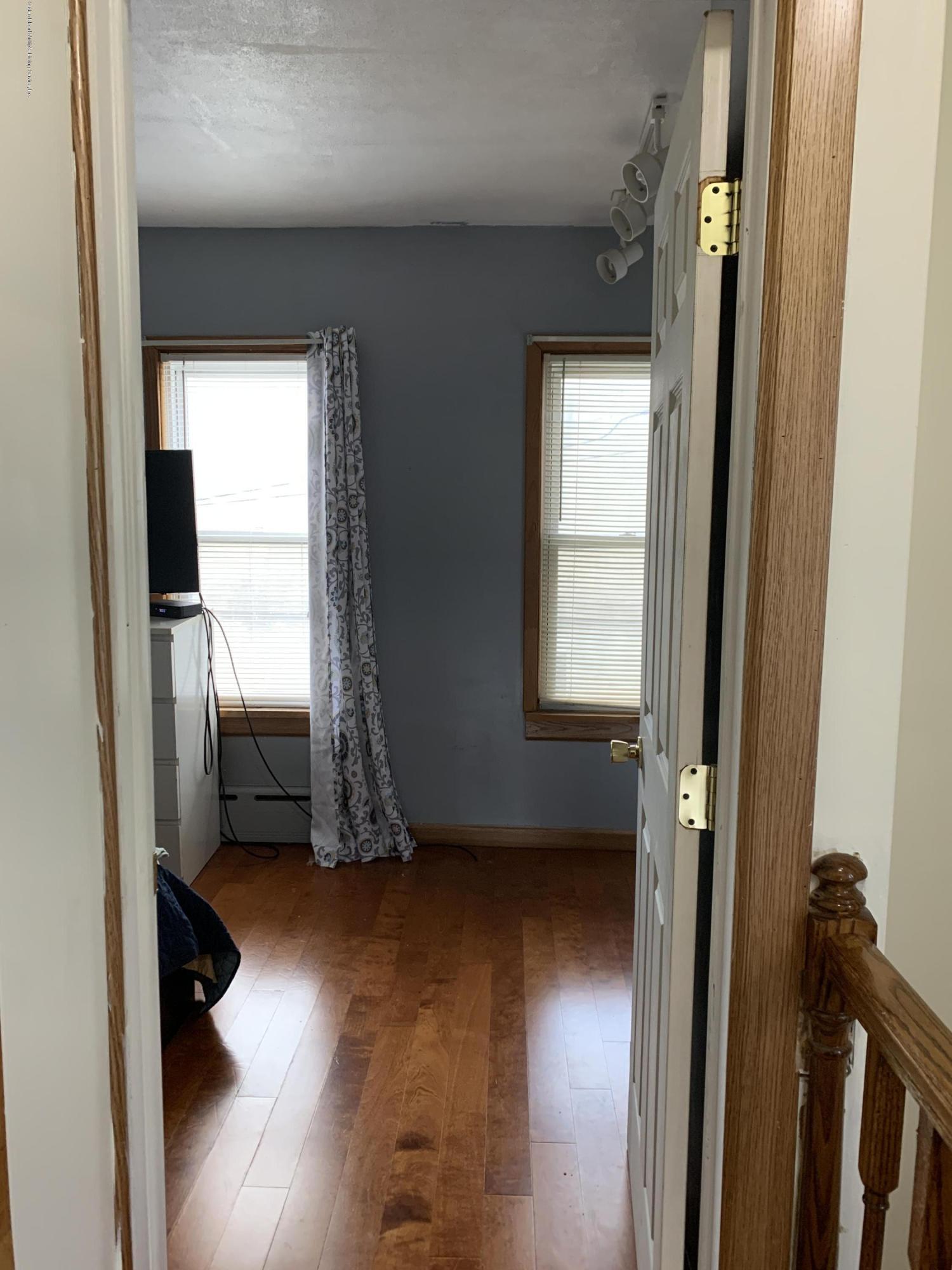 7 Lockman Place Staten Island, NY 10303 - Photo 24 of 41 a view of entryway with livingroom and bedroom