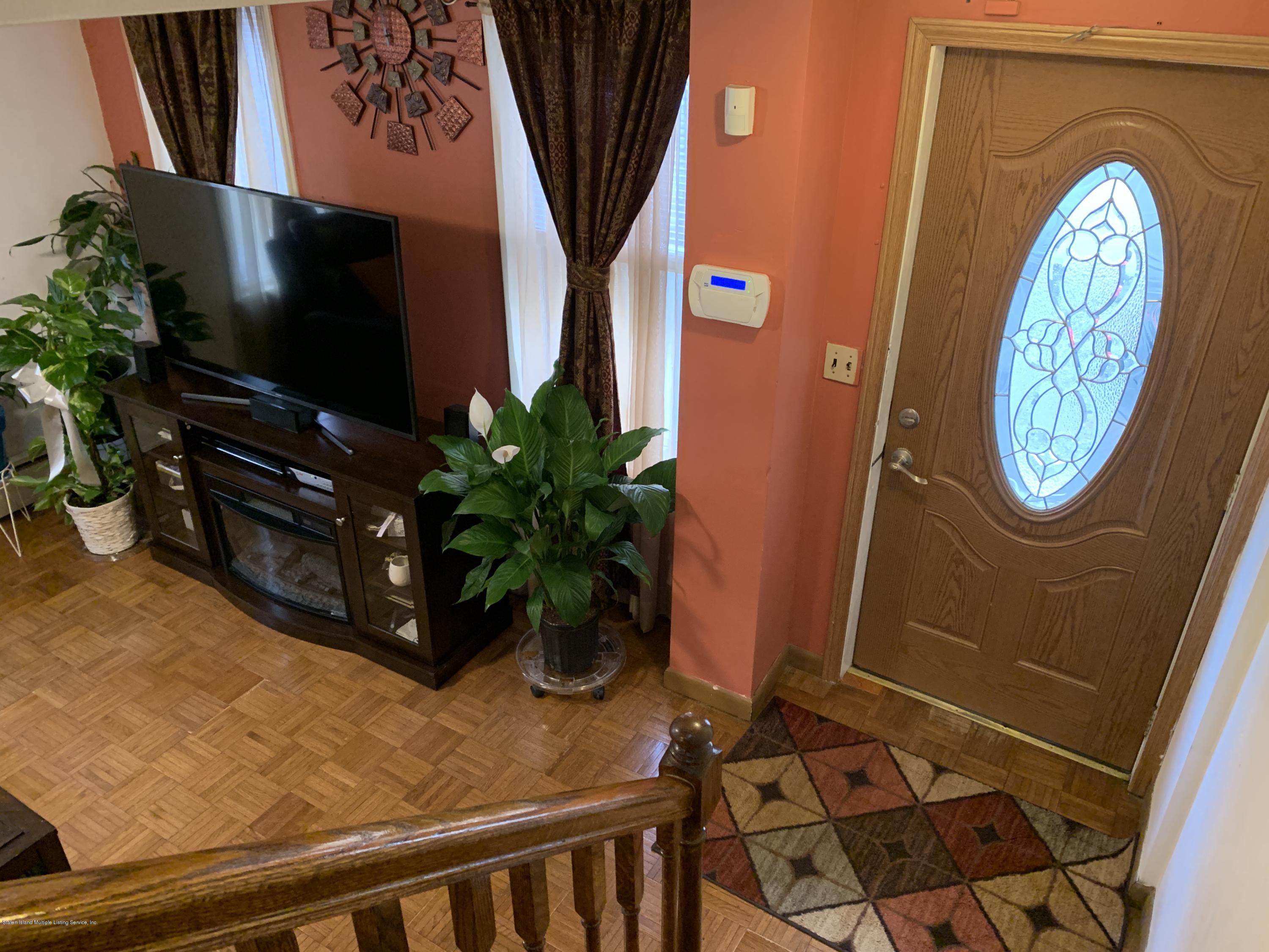 7 Lockman Place Staten Island, NY 10303 - Photo 31 of 41 a view of entryway with wooden floor