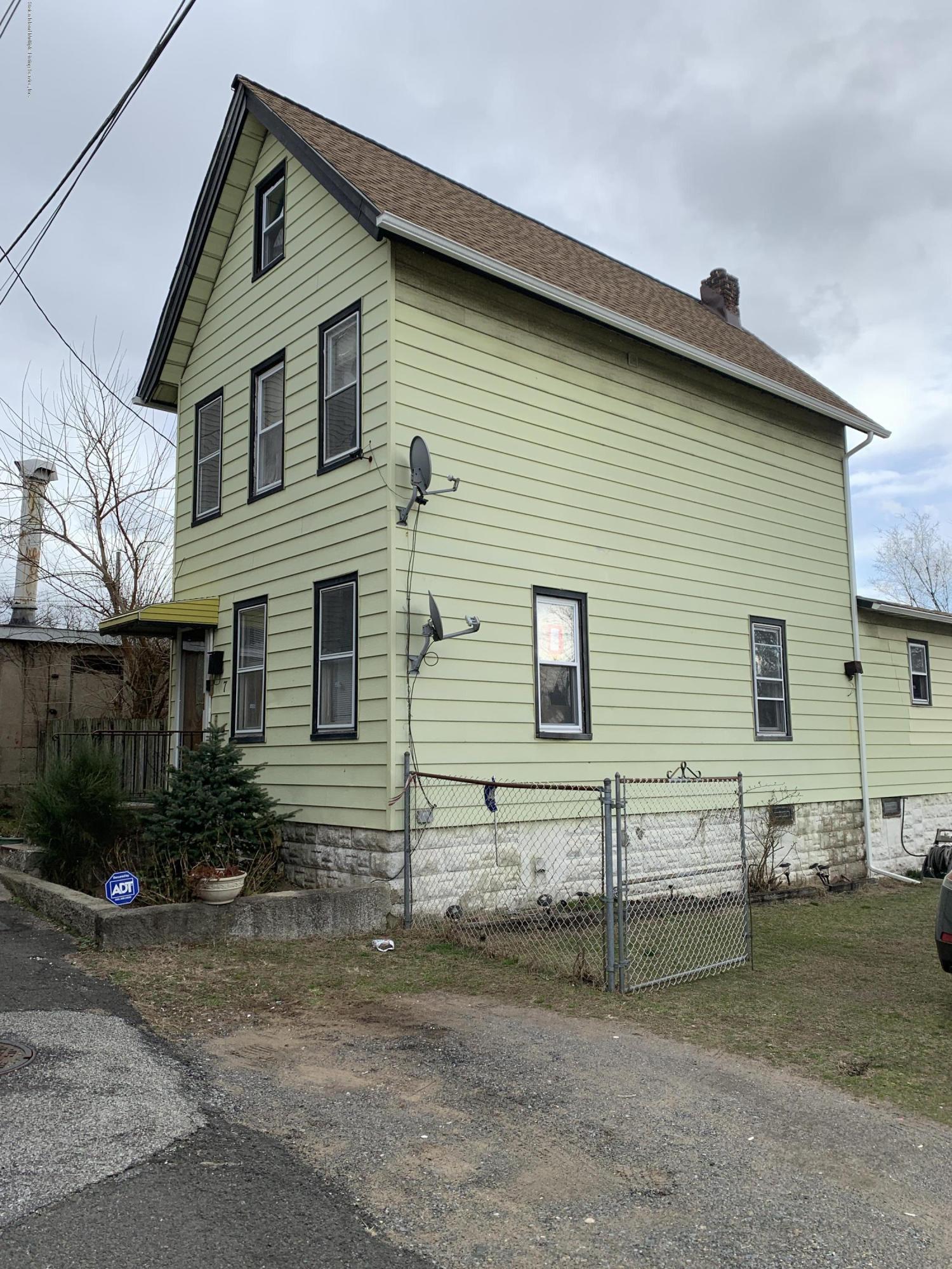 7 Lockman Place Staten Island, NY 10303 - Photo 4 of 41 a view of a house with a yard