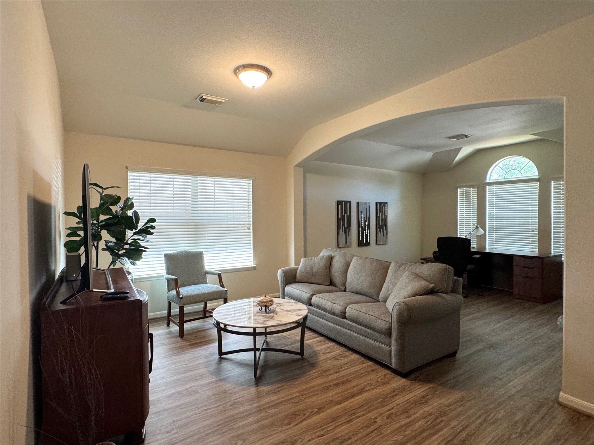 21818 Saragosa Pond Lane Spring, TX 77379 - Photo 2 of 15 The TV room includes a pull out bed and a second living space.