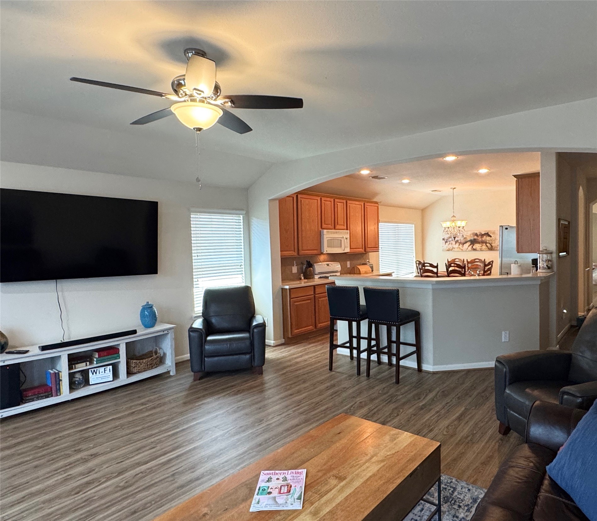 21818 Saragosa Pond Lane Spring, TX 77379 - Photo 6 of 15 The family room opens to the kitchen and breakfast room.