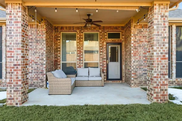 an aerial view of house with yard