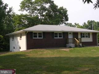 83 New Road Pedricktown, NJ 08067 - Photo 2 of 5 a view of a house with a yard