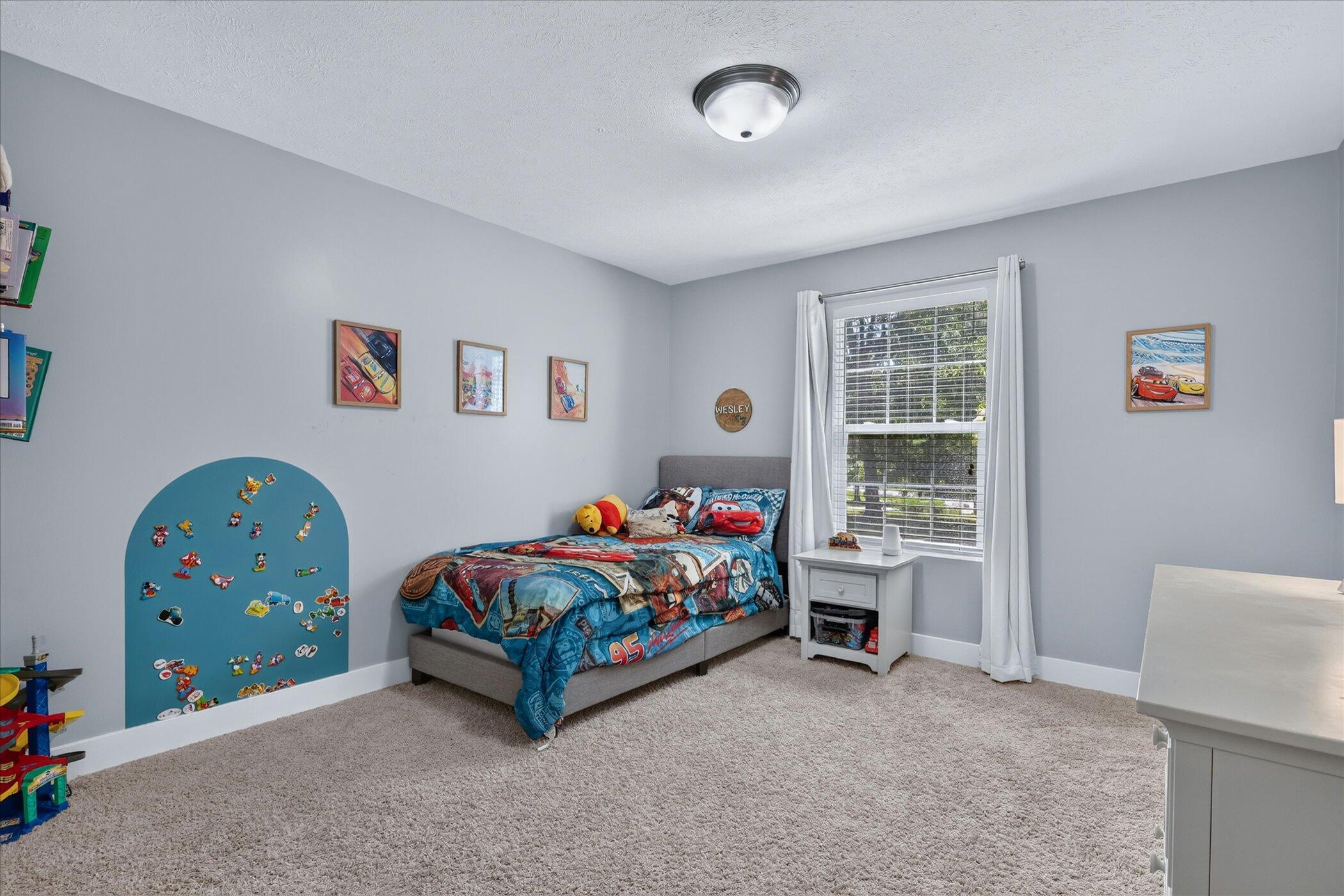 8669 Lilly Ridge Drive Alto, MI 49302 - Photo 27 of 53 27-8669-Lilly-Ridge-Dr-Alto-WindowStill