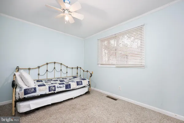 a view of staircase with white walls