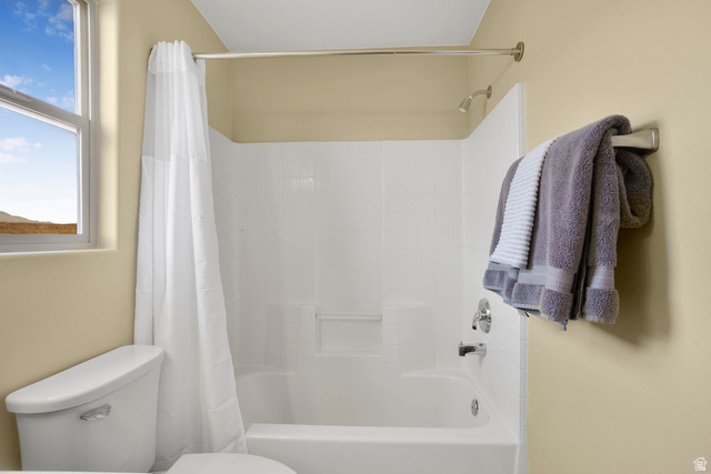 1570 South Rio Virgin Drive Washington, UT 84780 - Photo 63 of 71 Bathroom featuring shower / bathtub combination with curtain and toilet