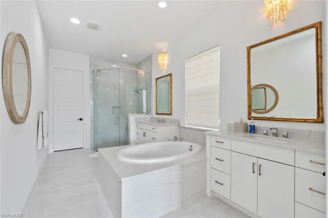 a bathroom with a double vanity sink mirror double vanity and mirrors