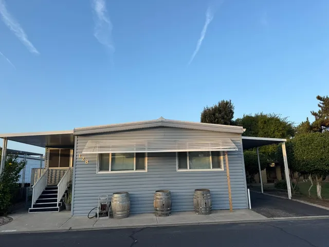 a front view of a house with a garage